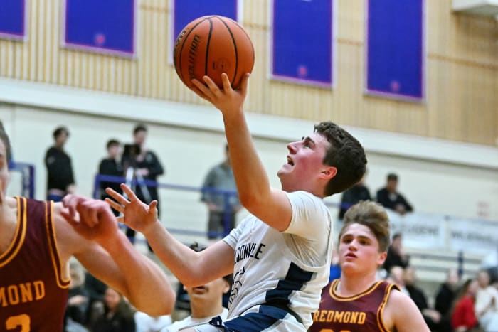 a Wilsonville Redmond 5A Oregon boys basketball quarterfinal 2024 Leon Neuschwander 15